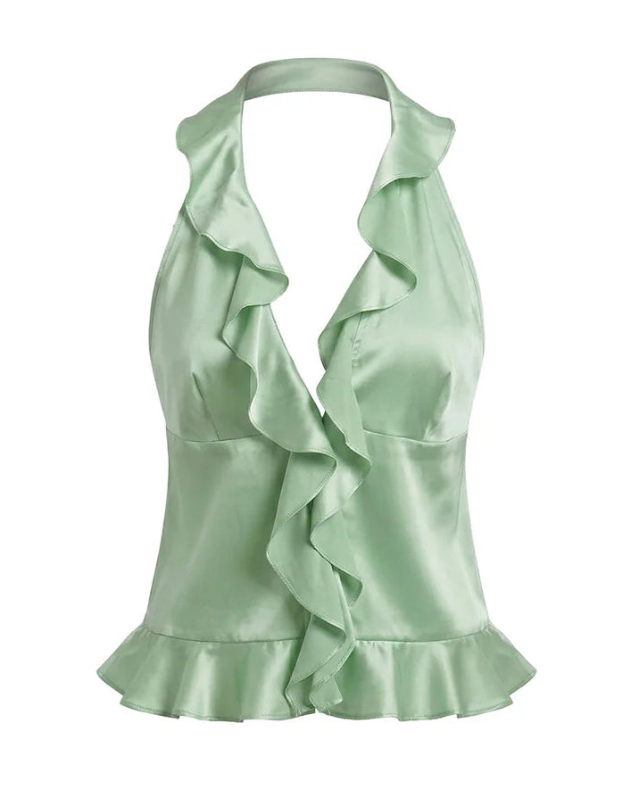 Light mint green silk halter top with ruffled details on a white background