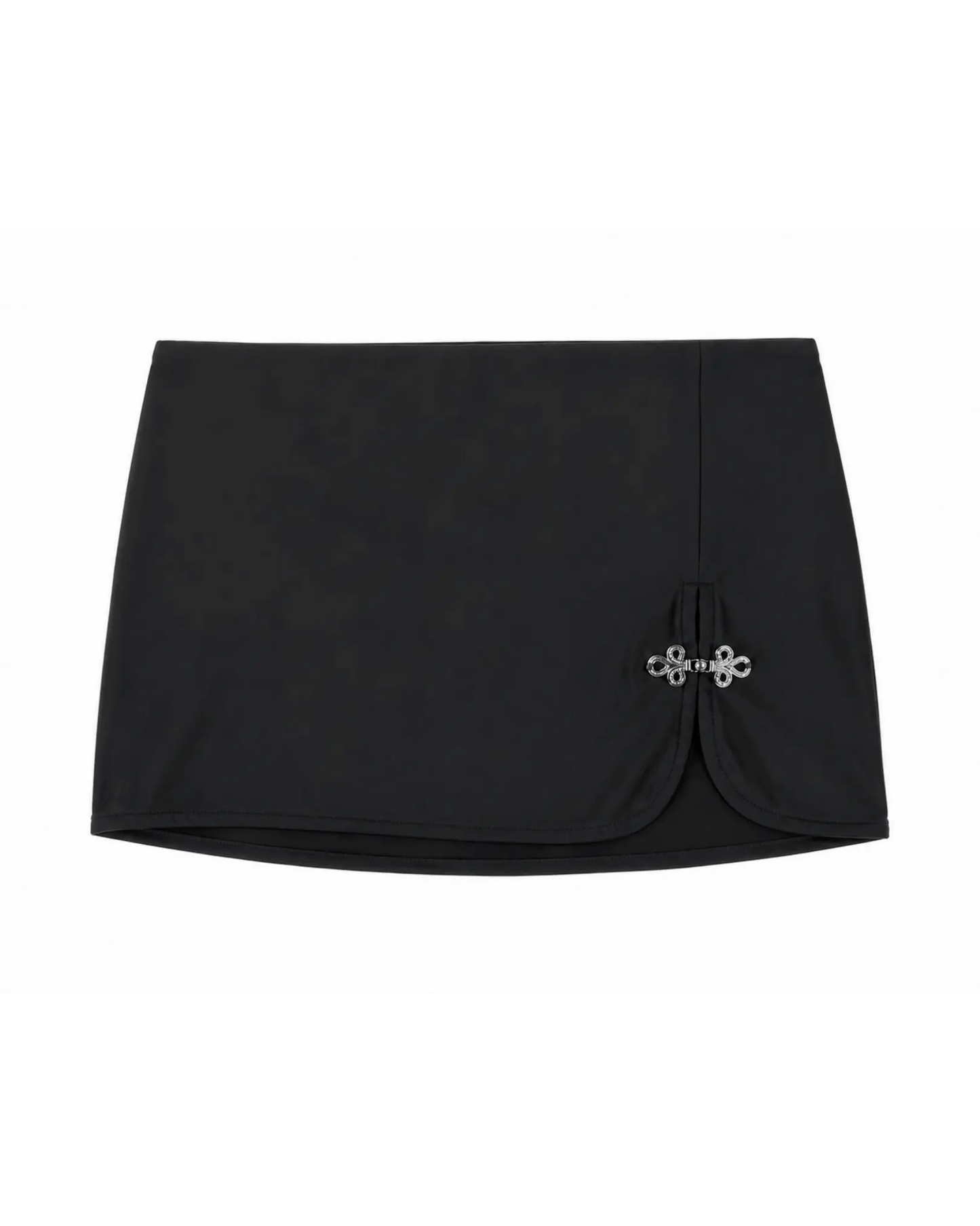 Black skirt with a decorative silver hardware on a white background